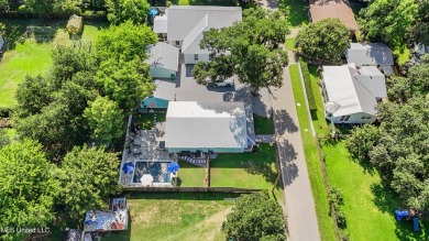 A Perfect Blend of Comfort, Style, and Coastal Living - In the on The Bridges Golf Club At Hollywood Casino in Mississippi - for sale on GolfHomes.com, golf home, golf lot