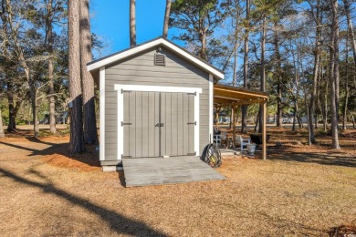 Welcome to this stunning 4-bedroom home nestled in the heart of on Wedgefield Plantation Golf Club in South Carolina - for sale on GolfHomes.com, golf home, golf lot