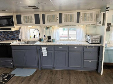 FULLY FURNISHED WITH GOLF CART. Beautiful, remodeled Camper on Lake Tansi Village Country Club in Tennessee - for sale on GolfHomes.com, golf home, golf lot
