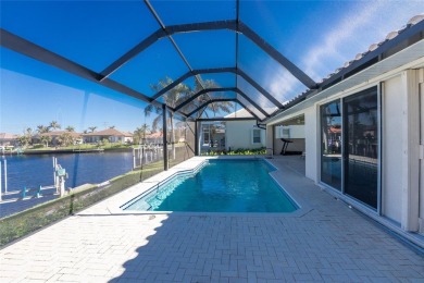 Impressive WATERFRONT pool home located in desirable deed on Twin Isles Country Club in Florida - for sale on GolfHomes.com, golf home, golf lot