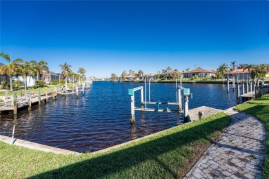 Impressive WATERFRONT pool home located in desirable deed on Twin Isles Country Club in Florida - for sale on GolfHomes.com, golf home, golf lot