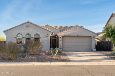 Nestled in Anthem Parkside at Merrill Ranch community. This home on Poston Butte Golf Club in Arizona - for sale on GolfHomes.com, golf home, golf lot