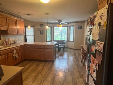 This 3 bedroom, 3 bath home with 3 car garage is located on a on Gibson Woods Golf Course in Illinois - for sale on GolfHomes.com, golf home, golf lot