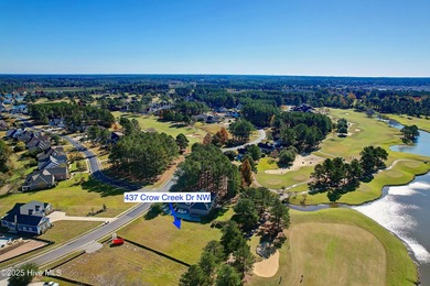Welcome to coastal living at its finest in Crow Creek! This on Crow Creek Golf Club in North Carolina - for sale on GolfHomes.com, golf home, golf lot
