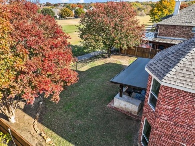 Experience luxurious living in this stunning 5-bedroom on Stonebridge Ranch Country Club in Texas - for sale on GolfHomes.com, golf home, golf lot