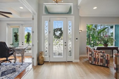 Welcome to timeless elegance and thoughtful design in this on The Grand Club Cypress Course in Florida - for sale on GolfHomes.com, golf home, golf lot