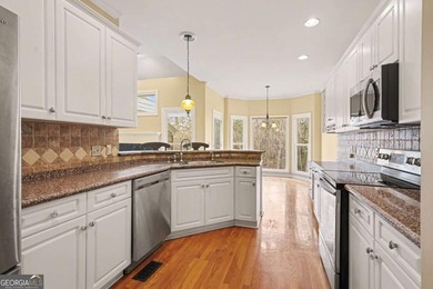 Welcome to this beautifully maintained ranch-style home with a on Bridgemill Golf Club in Georgia - for sale on GolfHomes.com, golf home, golf lot