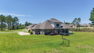Welcome to 244 Coastal Breeze Drive-a beautifully crafted on Windswept Dunes Golf Club in Florida - for sale on GolfHomes.com, golf home, golf lot