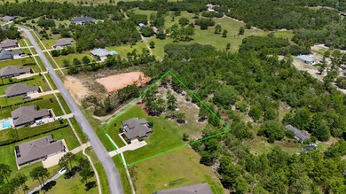 Welcome to 244 Coastal Breeze Drive-a beautifully crafted on Windswept Dunes Golf Club in Florida - for sale on GolfHomes.com, golf home, golf lot