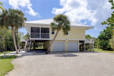 Walk one block to the beach! This stunning home has been on Beachview Golf Club in Florida - for sale on GolfHomes.com, golf home, golf lot