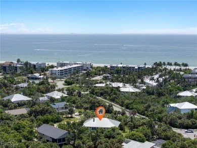 Walk one block to the beach! This stunning home has been on Beachview Golf Club in Florida - for sale on GolfHomes.com, golf home, golf lot