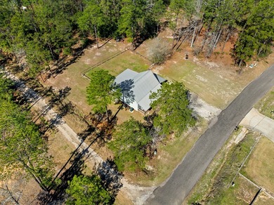 585 Pinehurst Drive offers the perfect blend of comfort, privacy on Rayburn Country Club in Texas - for sale on GolfHomes.com, golf home, golf lot