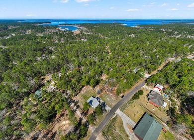 585 Pinehurst Drive offers the perfect blend of comfort, privacy on Rayburn Country Club in Texas - for sale on GolfHomes.com, golf home, golf lot