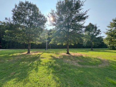 Nestled in a highly sought-after area just minutes from Cypress on Cypress Bend Golf Resort in Louisiana - for sale on GolfHomes.com, golf home, golf lot
