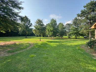 Nestled in a highly sought-after area just minutes from Cypress on Cypress Bend Golf Resort in Louisiana - for sale on GolfHomes.com, golf home, golf lot