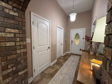 Nestled in a highly sought-after area just minutes from Cypress on Cypress Bend Golf Resort in Louisiana - for sale on GolfHomes.com, golf home, golf lot