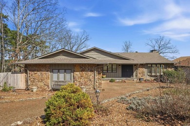 Discover exceptional lake & mountain views from this beautifully on Indian Hills Country Club in Arkansas - for sale on GolfHomes.com, golf home, golf lot