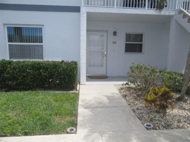 A golfer's dream! First floor, corner unit condo located on Hole on Deep Creek Golf Club in Florida - for sale on GolfHomes.com, golf home, golf lot