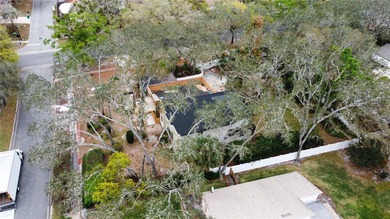 Build your dream home on this rare 0.47 acre corner lot located on Tuscawilla Country Club in Florida - for sale on GolfHomes.com, golf home, golf lot