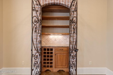 Located within the gated Le Triomphe community, this French on LeTriomphe Golf and Country Club in Louisiana - for sale on GolfHomes.com, golf home, golf lot