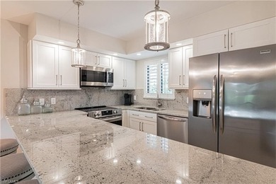 Ultimate sophisticated elegance awaits you upon entering a on Eagle Creek Golf and Country Club in Florida - for sale on GolfHomes.com, golf home, golf lot