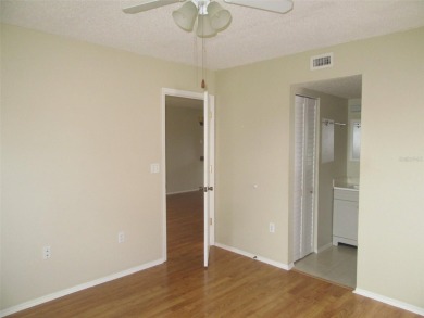 A golfer's dream! First floor, corner unit condo located on Hole on Deep Creek Golf Club in Florida - for sale on GolfHomes.com, golf home, golf lot
