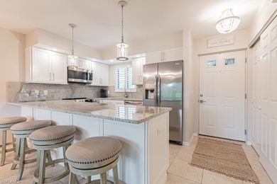 Ultimate sophisticated elegance awaits you upon entering a on Eagle Creek Golf and Country Club in Florida - for sale on GolfHomes.com, golf home, golf lot