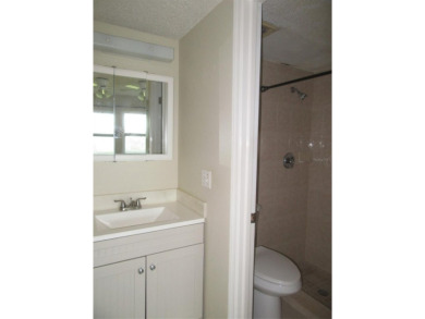 A golfer's dream! First floor, corner unit condo located on Hole on Deep Creek Golf Club in Florida - for sale on GolfHomes.com, golf home, golf lot
