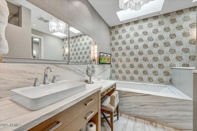 Set along the legendary greens of the Phoenician Resort Golf on The Phoenician  in Arizona - for sale on GolfHomes.com, golf home, golf lot