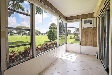 Easy Living with Golf Course Views in the Heart of Kings Point! on Kings Point Golf -Flanders Way in Florida - for sale on GolfHomes.com, golf home, golf lot