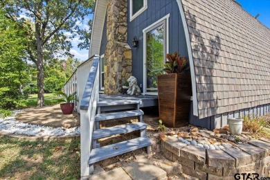 Nestled in the heart of Hideaway, Texas, this charming A-frame on Hide-A-Way Lake Golf Course in Texas - for sale on GolfHomes.com, golf home, golf lot