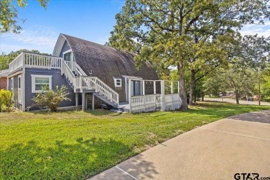 Nestled in the heart of Hideaway, Texas, this charming A-frame on Hide-A-Way Lake Golf Course in Texas - for sale on GolfHomes.com, golf home, golf lot