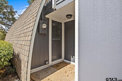 Nestled in the heart of Hideaway, Texas, this charming A-frame on Hide-A-Way Lake Golf Course in Texas - for sale on GolfHomes.com, golf home, golf lot