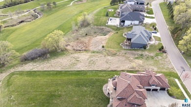 Golf Course Lot in Arbors Edge A stunning .78-acre lot is on Willow Run Golf Course in South Dakota - for sale on GolfHomes.com, golf home, golf lot