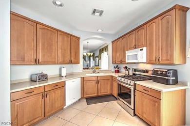 A gracious home set on golf course lot in Avila at Pelican on Pelican Preserve Golf Club in Florida - for sale on GolfHomes.com, golf home, golf lot