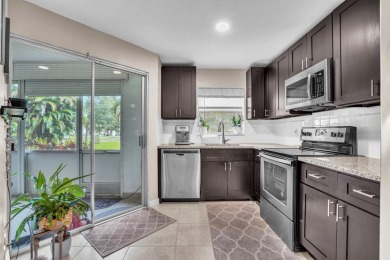 Move in ready 1st FLOOR condo in the desirable 55+ community of on Poinciana Golf Club in Florida - for sale on GolfHomes.com, golf home, golf lot