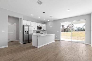 One or more photo(s) has been virtually staged. Walk to PINE on The Grand Club - Pine Lakes Course in Florida - for sale on GolfHomes.com, golf home, golf lot