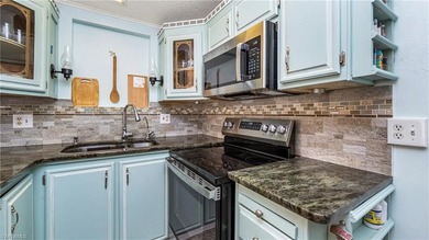 A golf cart is included, offering convenient access around the on The Rookery At Marco in Florida - for sale on GolfHomes.com, golf home, golf lot