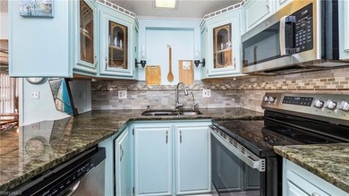 A golf cart is included, offering convenient access around the on The Rookery At Marco in Florida - for sale on GolfHomes.com, golf home, golf lot