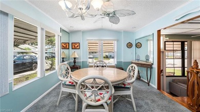 A golf cart is included, offering convenient access around the on The Rookery At Marco in Florida - for sale on GolfHomes.com, golf home, golf lot