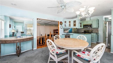 A golf cart is included, offering convenient access around the on The Rookery At Marco in Florida - for sale on GolfHomes.com, golf home, golf lot