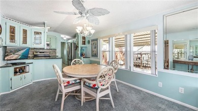 A golf cart is included, offering convenient access around the on The Rookery At Marco in Florida - for sale on GolfHomes.com, golf home, golf lot