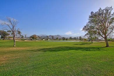 This home has a panoramic, south facing,  golf course and lake on Palm Desert Country Club in California - for sale on GolfHomes.com, golf home, golf lot