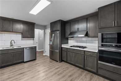 Spacious corner unit located in the Cypress Point Golf Club on Cypress Point Country Club in Virginia - for sale on GolfHomes.com, golf home, golf lot