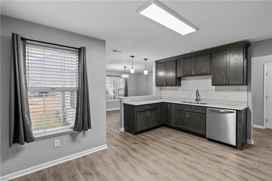 Spacious corner unit located in the Cypress Point Golf Club on Cypress Point Country Club in Virginia - for sale on GolfHomes.com, golf home, golf lot