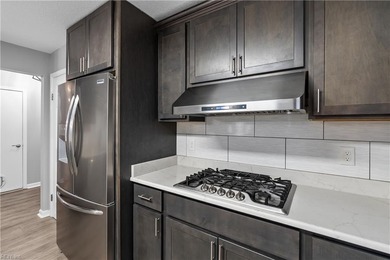 Spacious corner unit located in the Cypress Point Golf Club on Cypress Point Country Club in Virginia - for sale on GolfHomes.com, golf home, golf lot