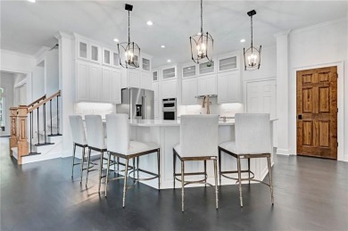 LAKEFRONT LIVING with over 180' of Lake Kedron views and on Canongate At Flat Creek Club in Georgia - for sale on GolfHomes.com, golf home, golf lot