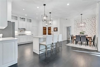 LAKEFRONT LIVING with over 180' of Lake Kedron views and on Canongate At Flat Creek Club in Georgia - for sale on GolfHomes.com, golf home, golf lot