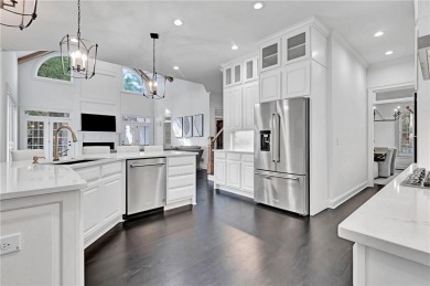 LAKEFRONT LIVING with over 180' of Lake Kedron views and on Canongate At Flat Creek Club in Georgia - for sale on GolfHomes.com, golf home, golf lot