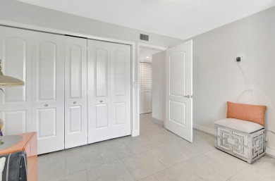 Coveted Renovated lst Floor Corner Condo with Garden and Golf on Gleneagles Golf and Country Club in Florida - for sale on GolfHomes.com, golf home, golf lot